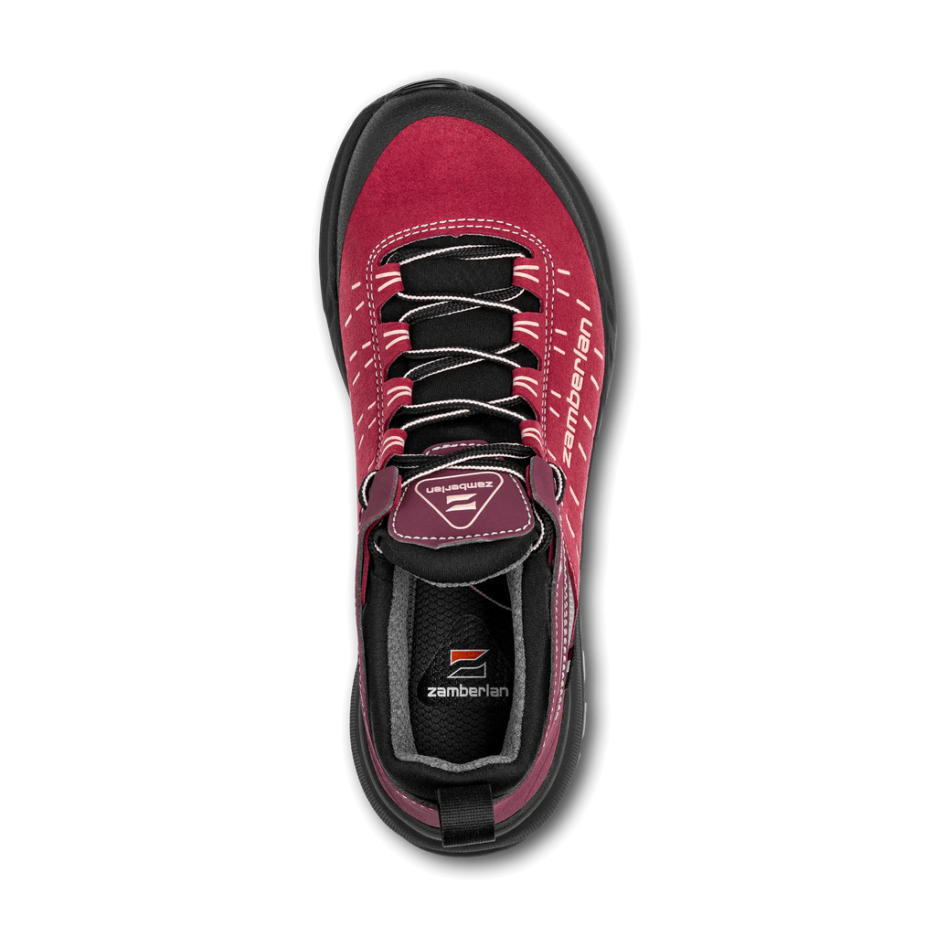 Red and black sneaker with visible branding on a white background