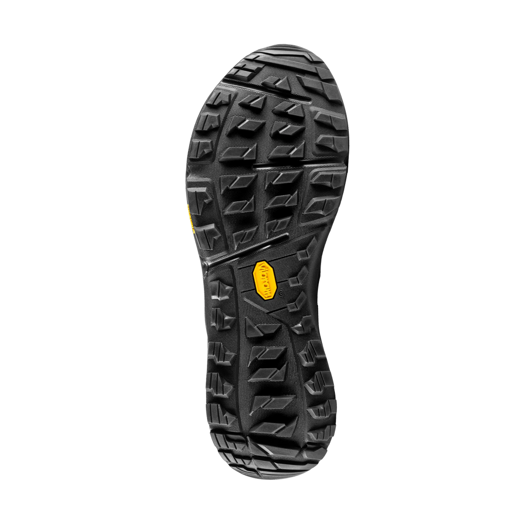 Black sole of a shoe with a yellow label on a black background