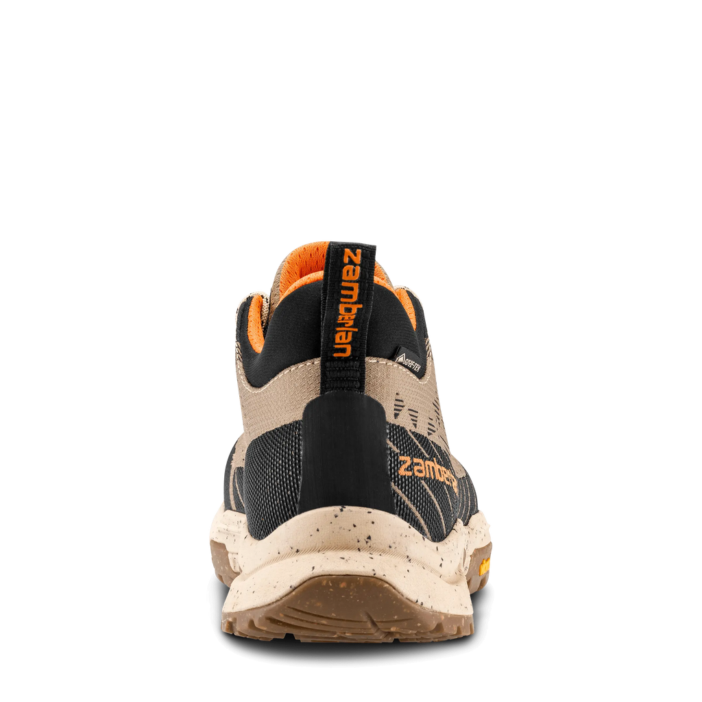 Back view of a hiking shoe with 'Zamberlan' branding on a black background