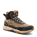 Hiking boot with black and brown design on a transparent background