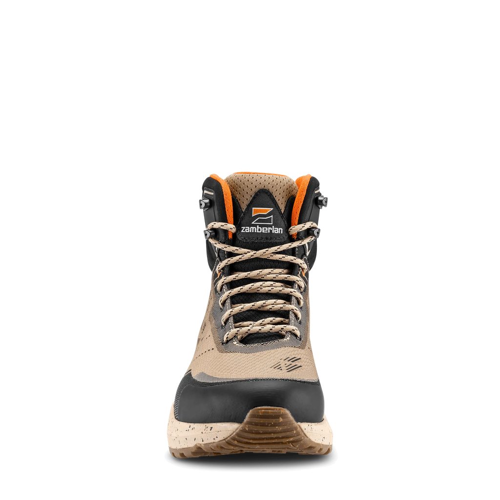 Hiking boot with orange accents on a black background