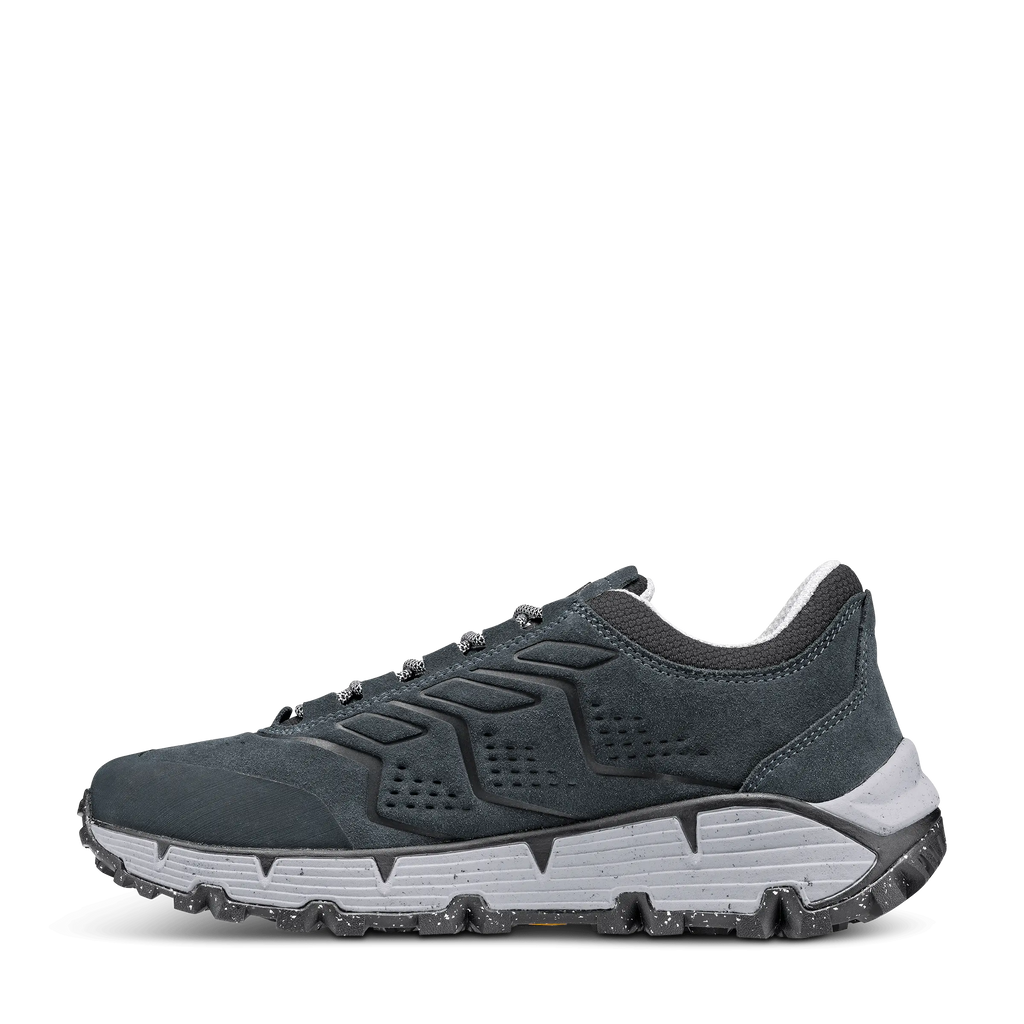 Dark gray athletic shoe with white sole on a black background