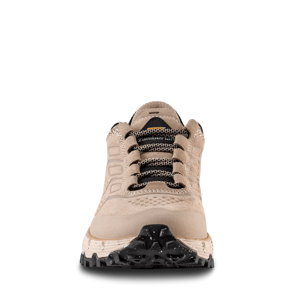 Beige sneaker with black sole on a white background