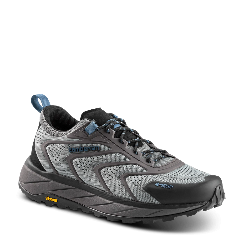 Gray hiking shoe with blue accents on a black background