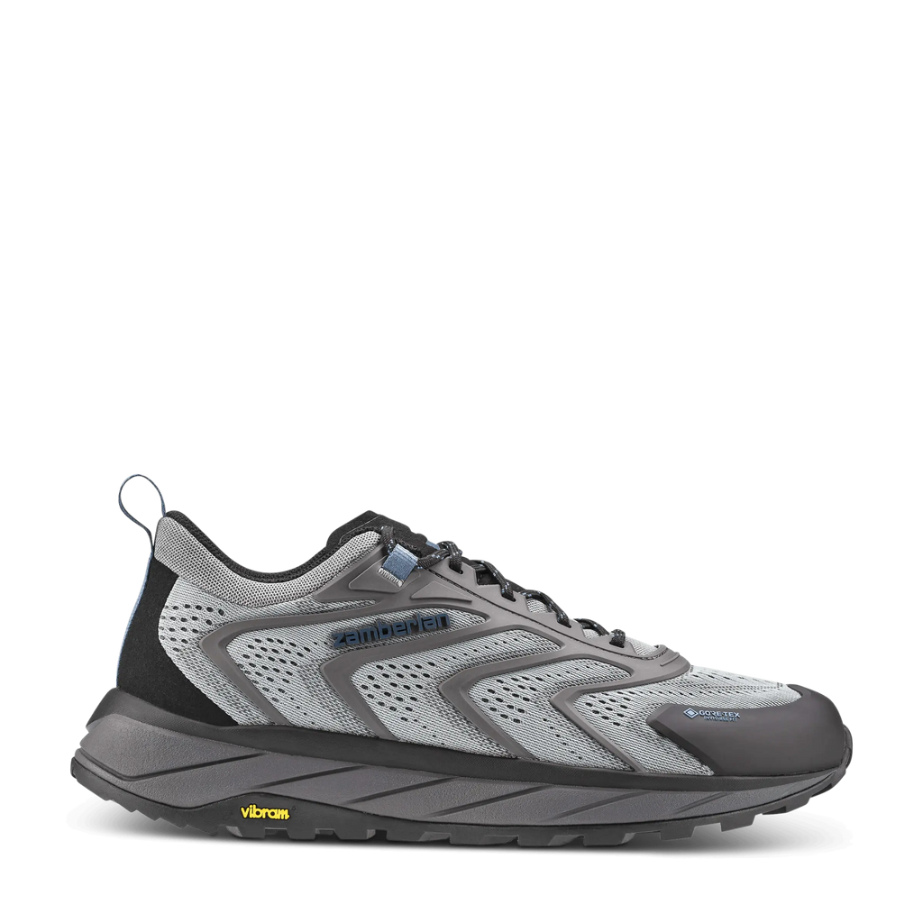 Gray and black athletic shoe on a white background
