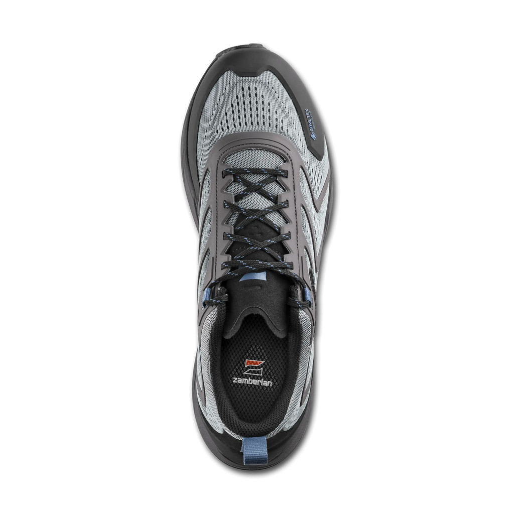 Gray and black athletic shoe on a white background