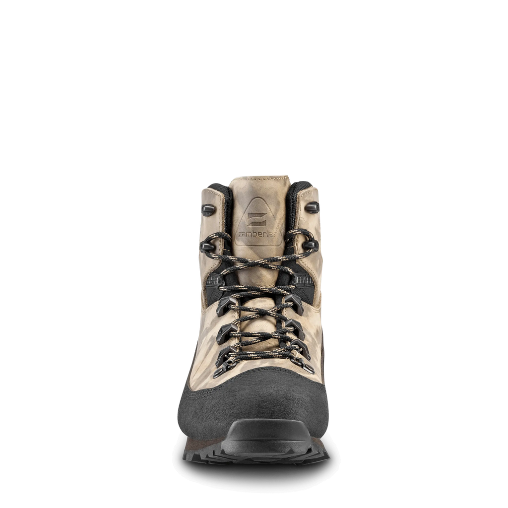 Hiking boot with laces on a black background