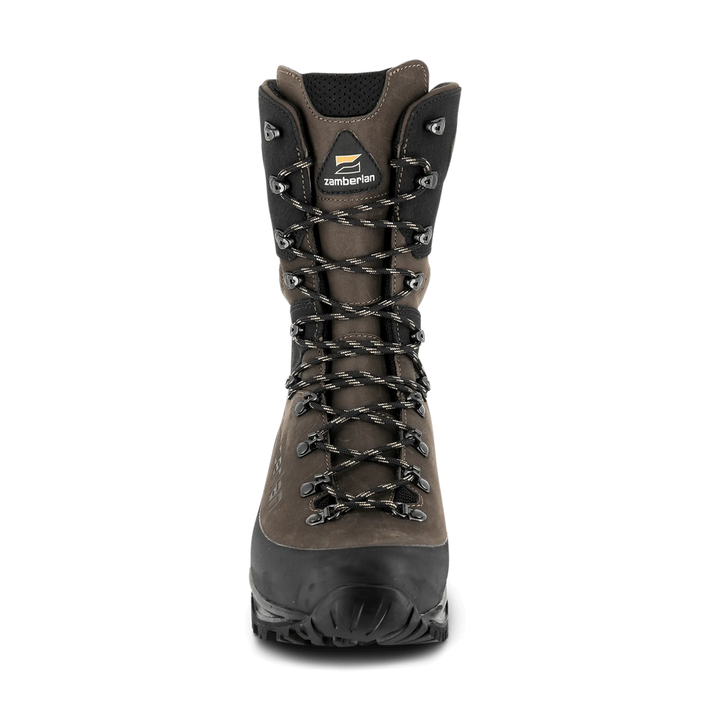 Brown hiking boot with black sole on a white background