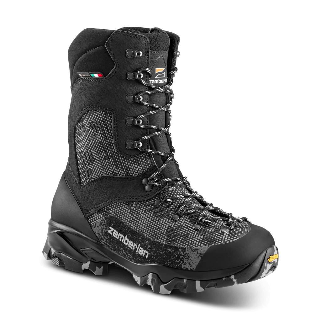 Black hiking boot with visible Zamberlan branding on a black background