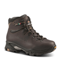 Brown hiking boot with visible brand logo on a black background