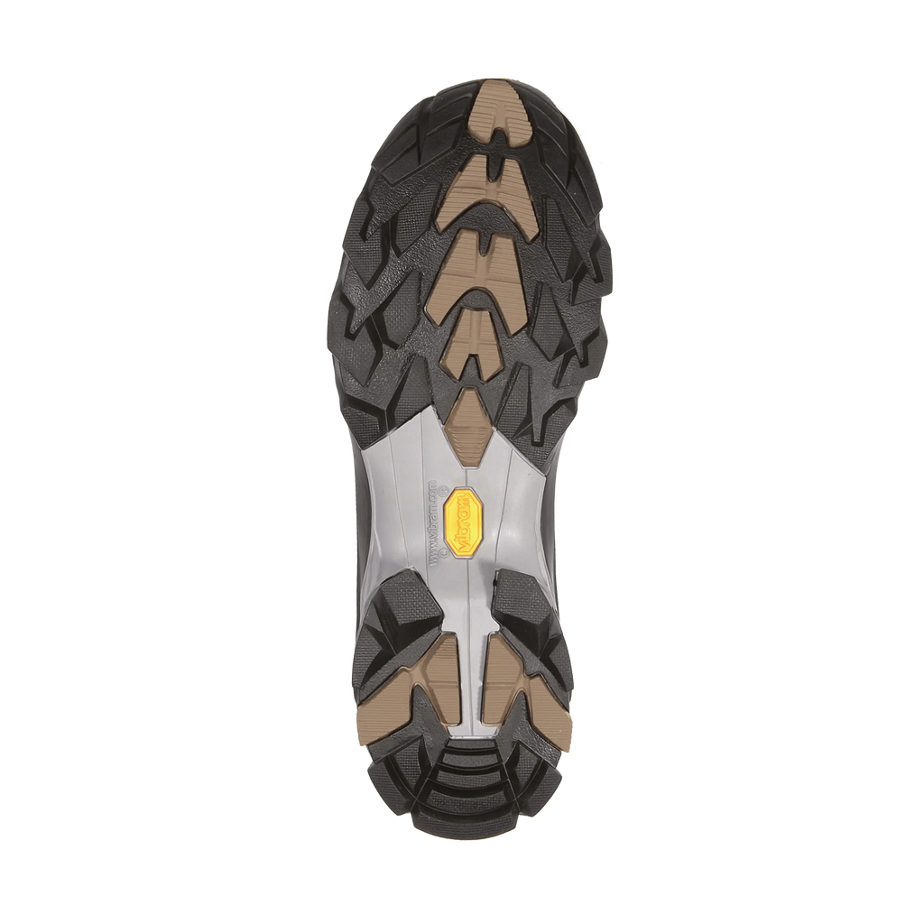 Close-up of a shoe sole with tread pattern and sole material on a white background
