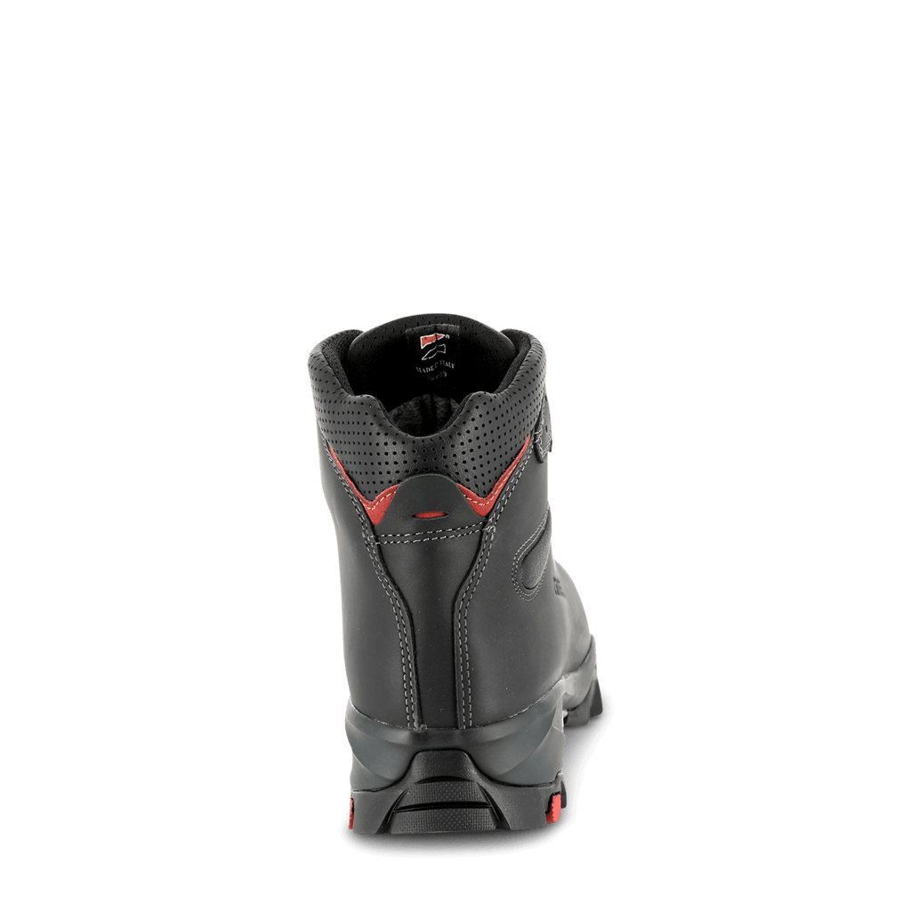 Black boot with red accents on a black background