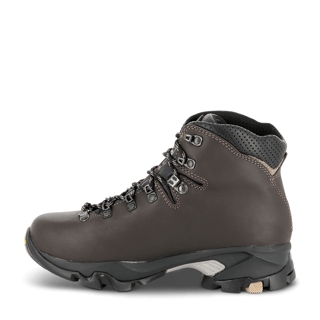 Brown hiking boot with visible brand logo on a black background