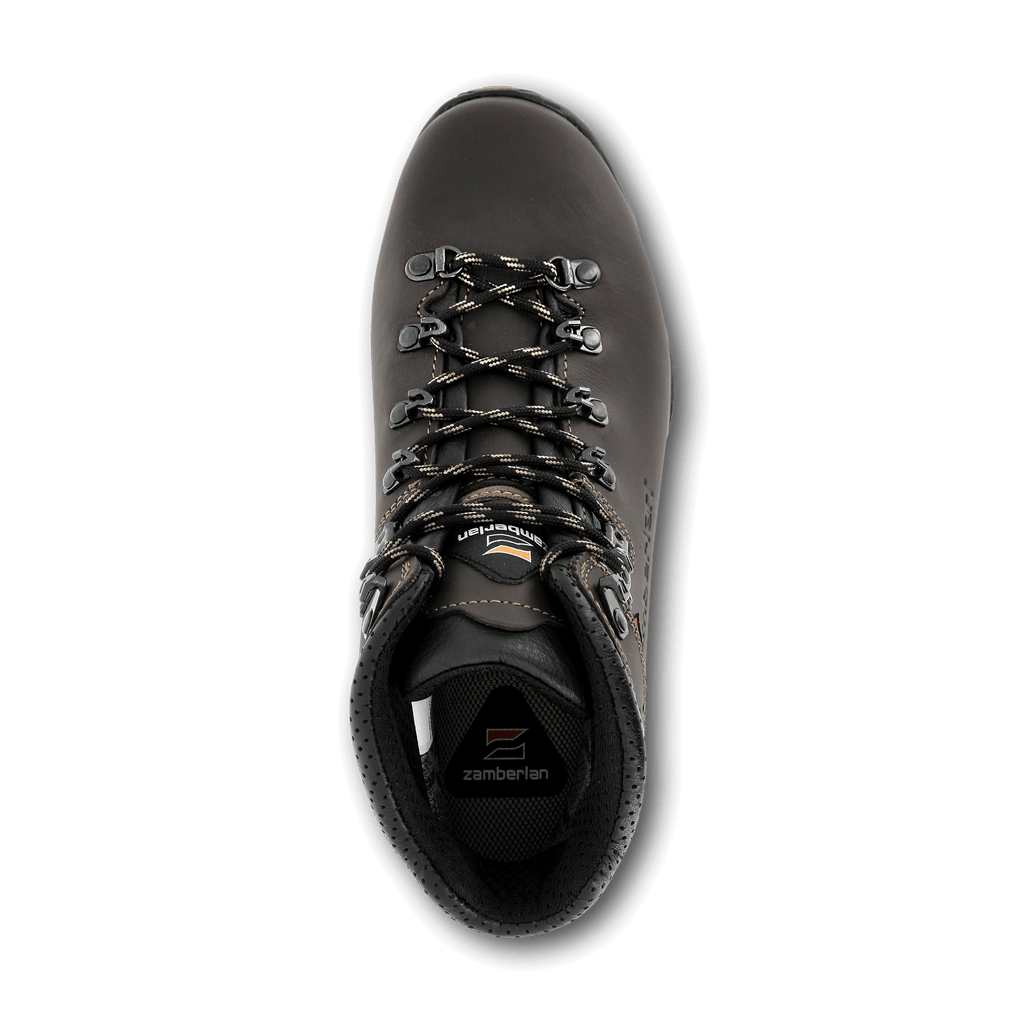 Brown hiking boot with visible brand logo on a black background