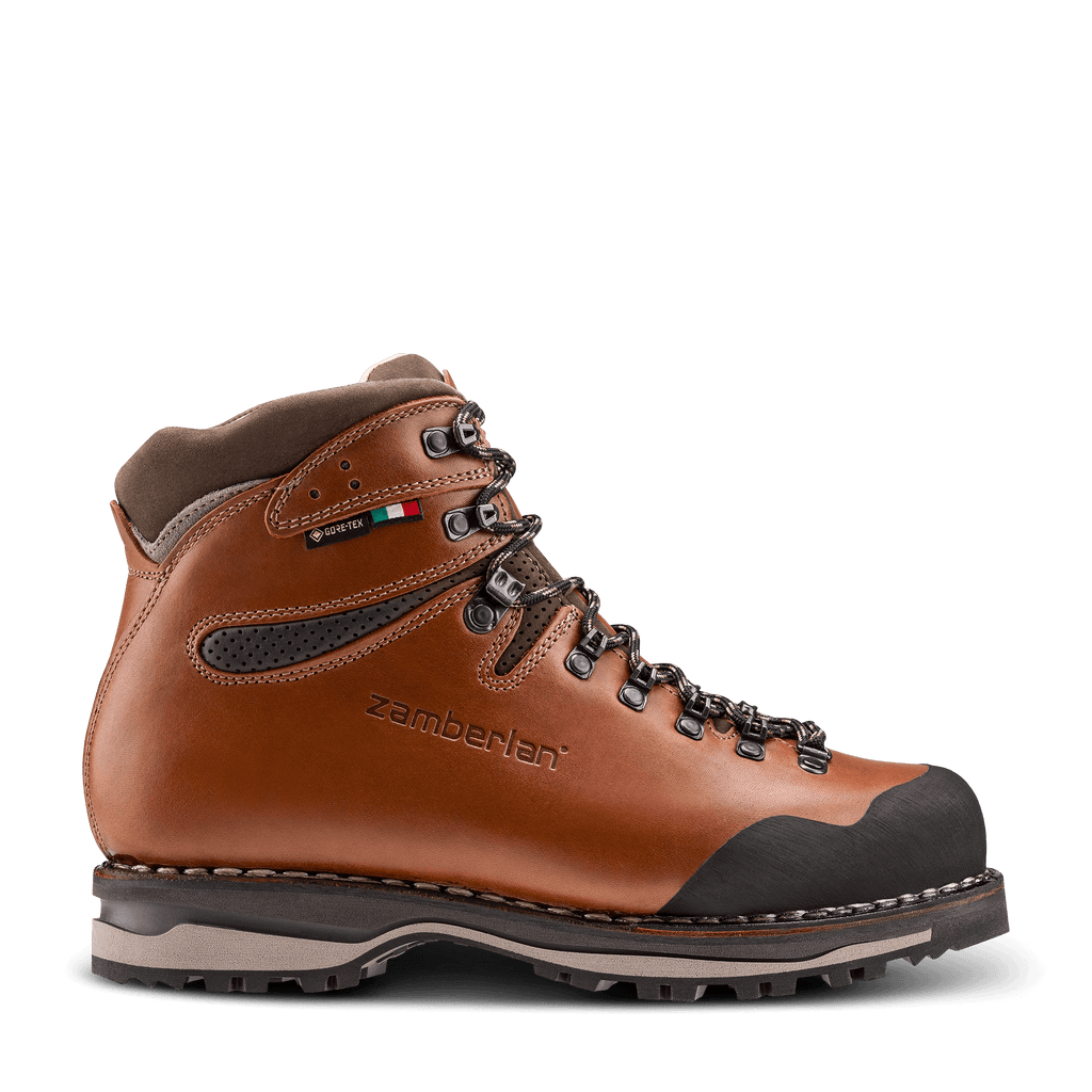 Brown hiking boot with black sole on a transparent background