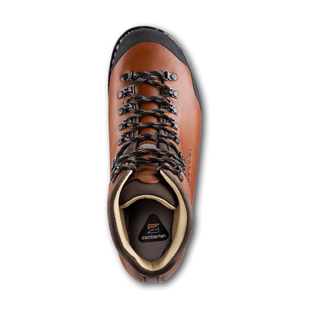 Brown hiking boot with black laces on a white background