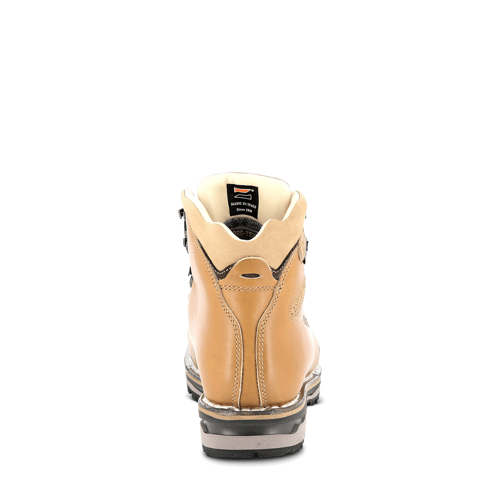 Tan hiking boot with a white sole on a black background