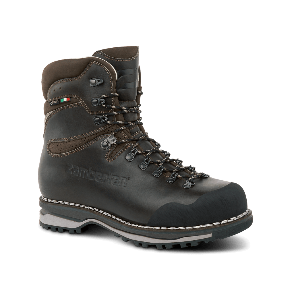 Brown hiking boot with visible brand logo on a transparent background
