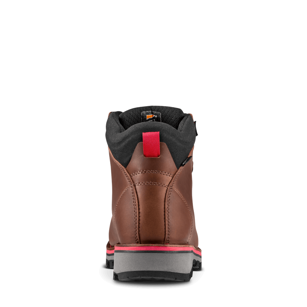 Brown boot with red pull tab on a black background